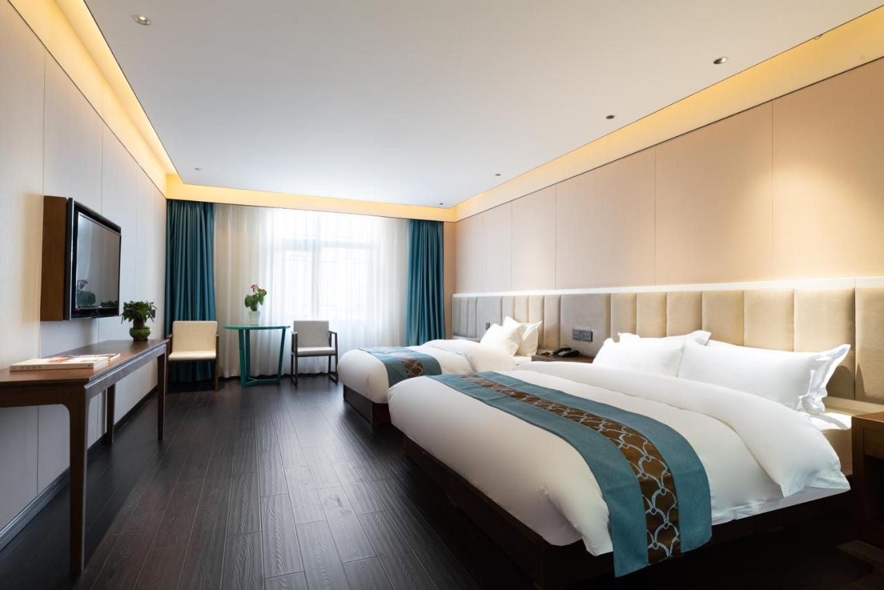 Hotel Tangfu - Located In The Center Adjacent To The Subway Station Close To Nanluoguxiang Gulou Temple Tiananmen Square Forbidden Temple Of Heaven Providing Laundry Car And Ticketing Services